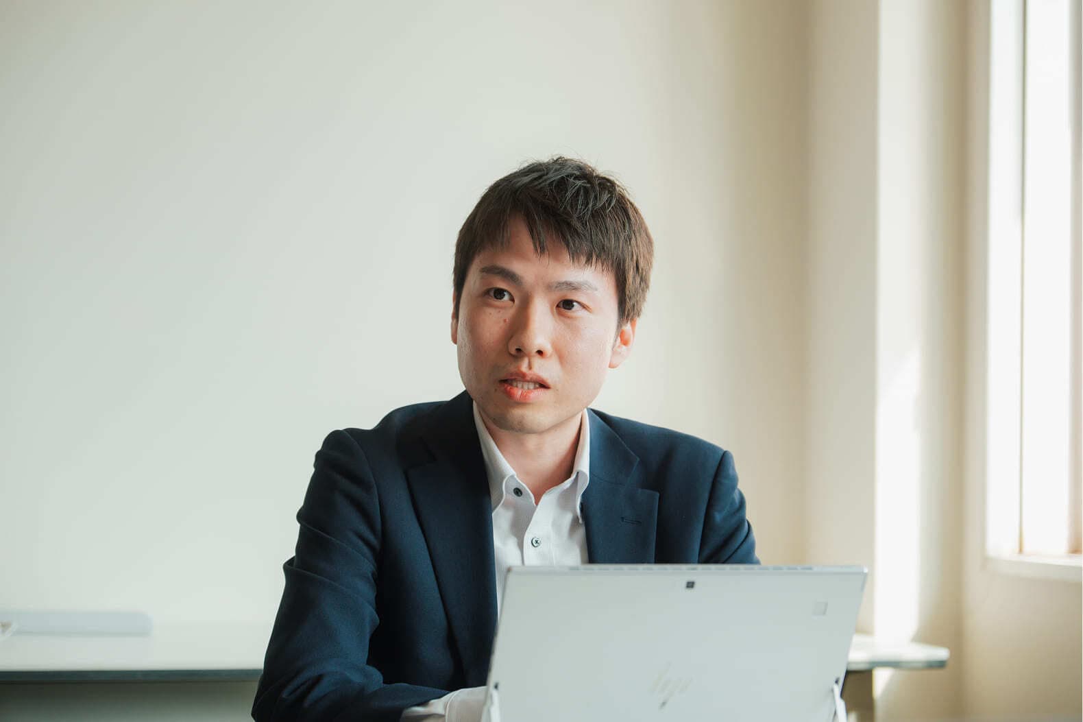 A Hokuriku Bank team member during the interview