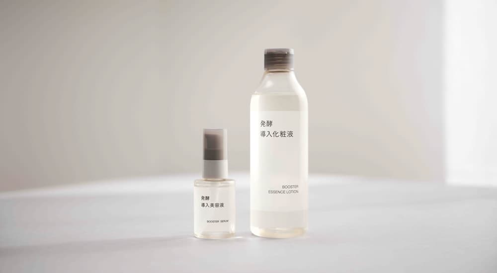 MUJI booster skincare products on a clean studio surface